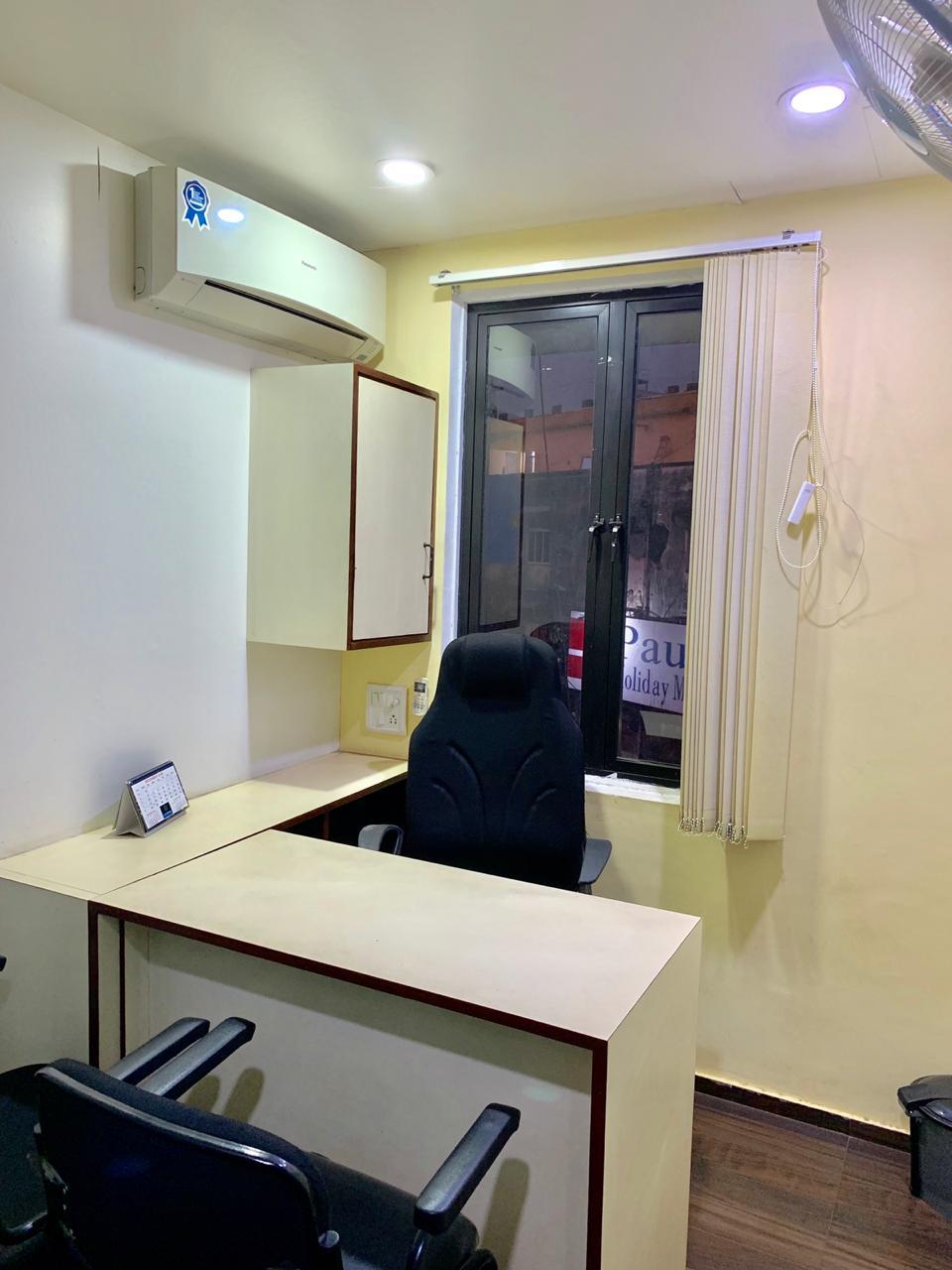 Private cabin with desk and seating